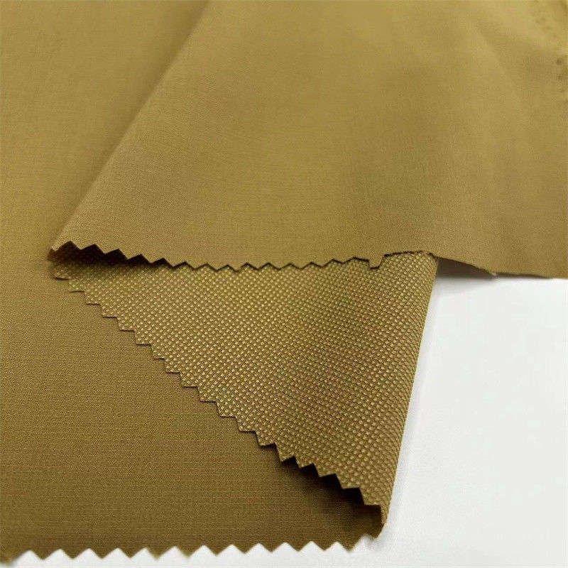 Poliestere Pearl Dot tessuto riciclato sostenibile 136GSM per magliette giacche sportive