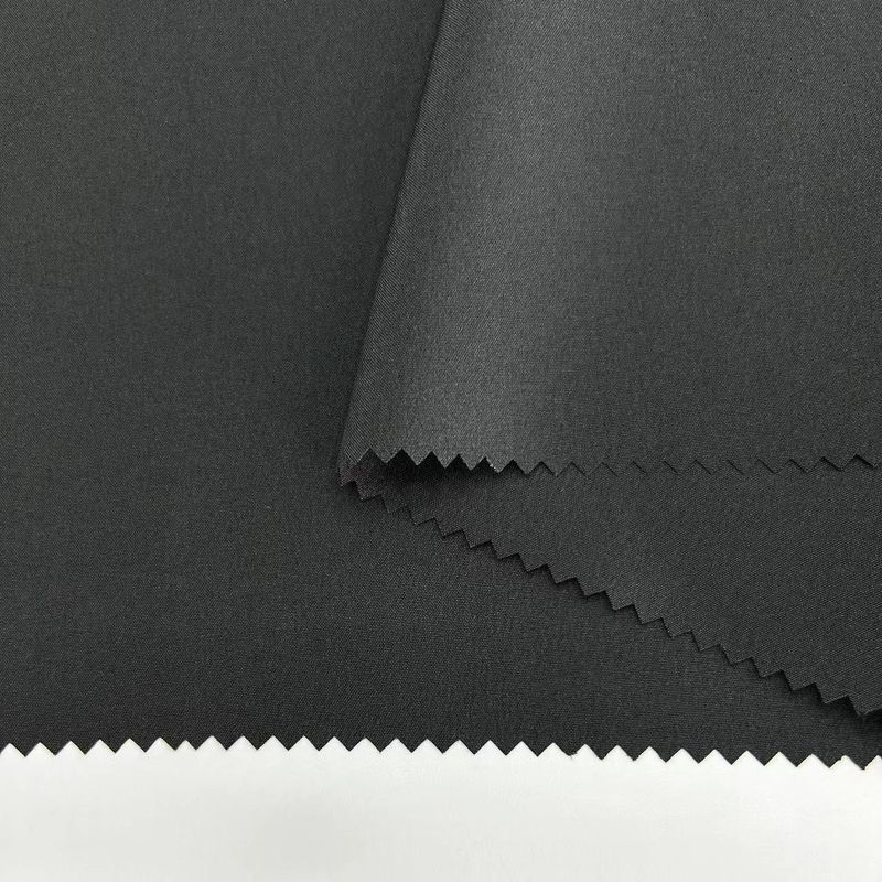 Tessuto a maglia a molla di poliestere 150D 150D*150D+40D 98% poliestere 2% spandex 166GSM